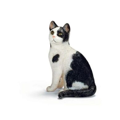 Игрушка-фигурка Сидящий черно-белый кот Schleich (13637) Spok